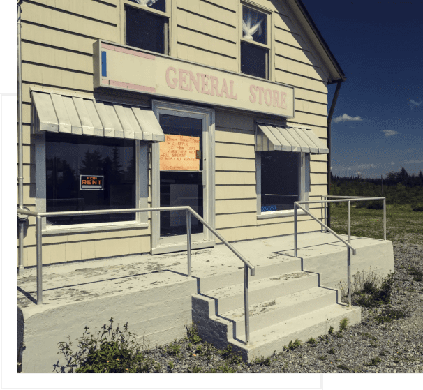 A store front with steps leading to the top.