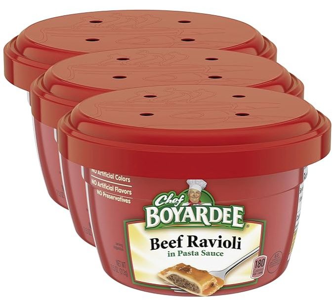 Three containers of Chef Boyardee Beef Ravioli.