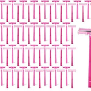 A group of pink disposable razors arranged with one larger razor on the side.